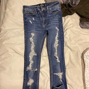 extremely ripped hollister jeans; width 23 length 28 ; fits size 00